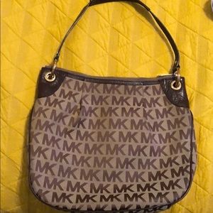 Michael Kors brown beige bucket bag some wear